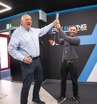 The Weetabix team celebrate their success at the Apex Racing Sim Centre in Corby